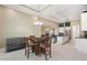 Bright dining area with four-chair table near the kitchen at 10380 Yellow Hammer Rd, Weeki Wachee, FL 34614
