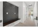 Hallway featuring a built-in bench with storage and access to other rooms at 10380 Yellow Hammer Rd, Weeki Wachee, FL 34614