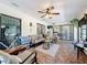 Florida room complete with updated furniture, lighting and updated flooring at 10411 Ireland St, Spring Hill, FL 34608