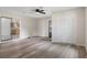 Living room features new floors and access to the kitchen at 10441 Mayflower Rd, Spring Hill, FL 34608