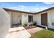 Charming single-story home with neutral paint, brown roof, landscaping, and a walkway at 11402 Shallowbrook Pl, Tampa, FL 33624