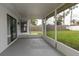 Spacious screened porch overlooking the backyard, ideal for outdoor enjoyment at 11494 Villa Rd, Spring Hill, FL 34609