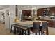 Gourmet kitchen featuring granite countertops, stainless steel appliances, and custom cabinetry throughout at 12403 Moneta Rd, Weeki Wachee, FL 34614