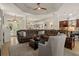Cozy living room open to the dining area and kitchen with ample seating at 12403 Moneta Rd, Weeki Wachee, FL 34614
