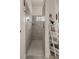 Walk in shower featuring tile surround and glass block window at 12403 Moneta Rd, Weeki Wachee, FL 34614