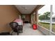 Spacious screened lanai with ceiling fan, perfect for entertaining or relaxing outdoors, rain or shine at 12458 Fish Cove Dr, Spring Hill, FL 34609
