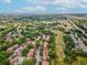 Aerial view of lush condo community close to golf course, beaches, and Tampa Road at 12920 Wedgewood Way # B, Hudson, FL 34667