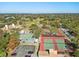 Aerial view of community amenities: tennis and basketball courts, pool, and golf course at 12920 Wedgewood Way # B, Hudson, FL 34667