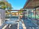 Comfortable picnic area with tennis court, bocce ball and seating offers a spot to relax and gather at 12920 Wedgewood Way # B, Hudson, FL 34667