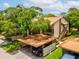 Beautiful two-story condo with private carports and mature landscaping in a desirable neighborhood at 12920 Wedgewood Way # B, Hudson, FL 34667