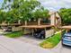 Charming condo with carport parking and private entrance staircase; well-maintained landscaping at 12920 Wedgewood Way # B, Hudson, FL 34667
