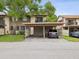 Beautiful two-story condo with private carports and mature landscaping in a desirable neighborhood at 12920 Wedgewood Way # B, Hudson, FL 34667