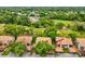 Charming townhome exterior with covered parking and well-maintained landscaping for a welcoming curb appeal at 12920 Wedgewood Way # B, Hudson, FL 34667