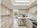 Spacious kitchen with updated appliances and plenty of counter space at 12920 Wedgewood Way # B, Hudson, FL 34667