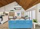 Lobby with high vaulted ceilings, comfortable seating, and modern lighting creating a welcoming atmosphere at 12920 Wedgewood Way # B, Hudson, FL 34667