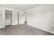 Bright bedroom features a neutral color palette and a closet with sliding doors at 12936 Parkwood St, Hudson, FL 34669