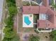 Aerial view of the community center with a pool, outdoor seating, and playground at 13248 Linzia Ln, Spring Hill, FL 34609