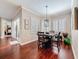 Charming breakfast nook offers natural light and a view into the living room with sliding glass doors at 13248 Linzia Ln, Spring Hill, FL 34609