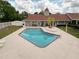 Community pool area featuring comfortable chaise lounges and seating for residents at 13248 Linzia Ln, Spring Hill, FL 34609