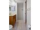 This bathroom includes a vanity, tile flooring, and large walk-in shower at 13307 Woodward Dr, Hudson, FL 34667