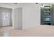 A living room with tile floors, a fireplace and neutral walls at 13307 Woodward Dr, Hudson, FL 34667