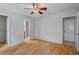 This main bedroom provides wood floors and includes both bathroom and closet access at 13307 Woodward Dr, Hudson, FL 34667