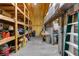 A different view of a generously sized storage area with shelving and easy access at 14031 Hexam Rd, Brooksville, FL 34613