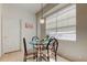 Breakfast nook with a glass table, perfect for morning meals at 14466 Tamarind Loop, Spring Hill, FL 34609