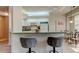 Kitchen featuring a breakfast bar with seating, ideal for quick meals at 14466 Tamarind Loop, Spring Hill, FL 34609