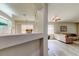 Open living area with hardwood floors and lots of light at 14466 Tamarind Loop, Spring Hill, FL 34609