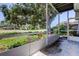 Enjoy this screened patio that opens to a verdant golf course at 14466 Tamarind Loop, Spring Hill, FL 34609