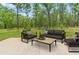 A cozy patio space with outdoor furniture, perfect for relaxing in the fresh air at 15414 Green Jay Rd, Weeki Wachee, FL 34614