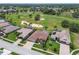 Aerial view of home showcasing the golf course neighborhood at 18223 Nestlebranch Ct, Hudson, FL 34667