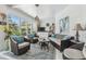 Inviting sunroom featuring tile floor, and comfortable wicker furniture at 18223 Nestlebranch Ct, Hudson, FL 34667