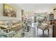Elegant living room with hardwood floors, neutral colors, and ample natural light at 18223 Nestlebranch Ct, Hudson, FL 34667