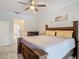 Bright bedroom with a view into the ensuite bathroom at 18902 Saint Laurent Dr, Lutz, FL 33558