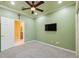 Bedroom with a ceiling fan at 19418 Morden Blush Dr, Lutz, FL 33558