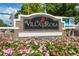 Villa Rosa community sign with pink flower beds lining the monument at 19418 Morden Blush Dr, Lutz, FL 33558