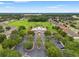 Aerial view of the community pool and amenity center, showing the landscaping and surrounding neighborhood at 1987 Trillium Blvd, Brooksville, FL 34604