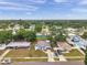 Neighborhood aerial shot showcasing the homes, mature trees, and the surrounding community at 2012 Warrington Way, Tampa, FL 33619