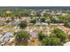 An aerial perspective of a neighborhood with tree-lined streets and single-Gathering homes, offering a serene and Gathering-friendly vibe at 2012 Warrington Way, Tampa, FL 33619