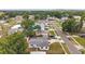 Overhead view of a residential street with well-maintained homes and green lawns at 2012 Warrington Way, Tampa, FL 33619