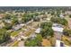 A neighborhood boasting a mix of well-maintained single-Gathering homes, green spaces, and tree-lined streets at 2012 Warrington Way, Tampa, FL 33619