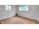 Bedroom with wood floors and natural light at 2012 Warrington Way, Tampa, FL 33619