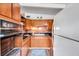 Quaint kitchen featuring brick backsplash and classic oven at 2012 Warrington Way, Tampa, FL 33619