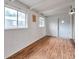 Bright and airy room with wood floors and white walls at 2012 Warrington Way, Tampa, FL 33619