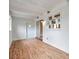 Bright room with wood floors and large window at 2012 Warrington Way, Tampa, FL 33619