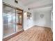 Open living space with new wood floors and sliding glass doors at 2012 Warrington Way, Tampa, FL 33619