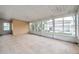 Enclosed patio with tiled floor and views of the outdoor space at 2012 Warrington Way, Tampa, FL 33619