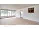 Enclosed patio with tiled floor and views of the outdoor space at 2012 Warrington Way, Tampa, FL 33619